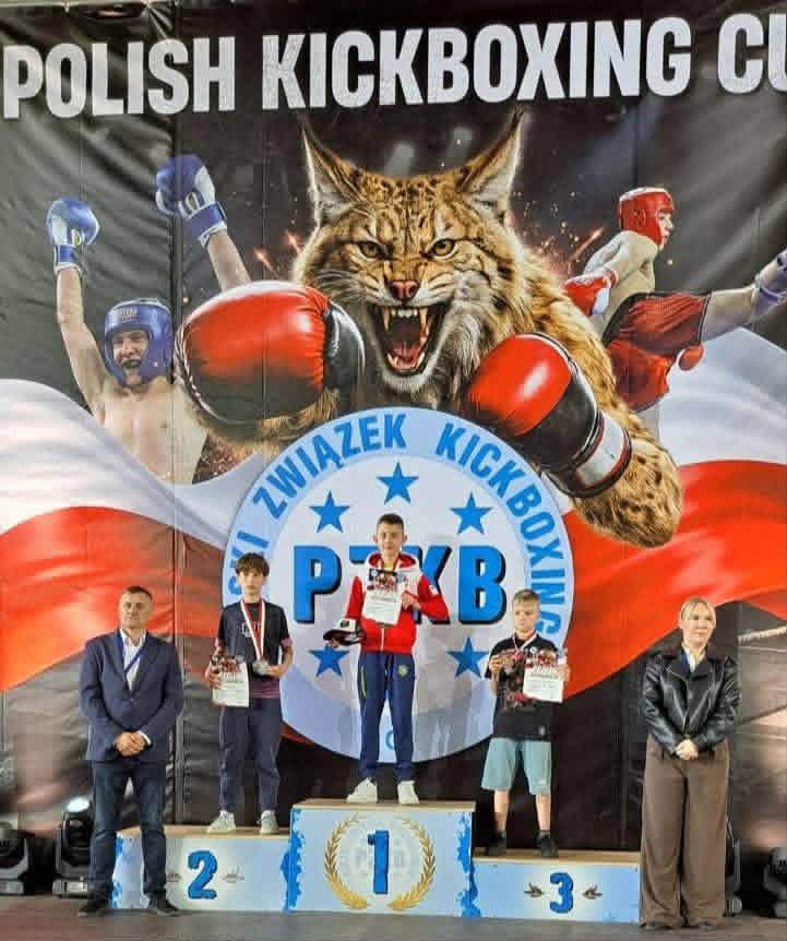 Hugo Budny na podium z medalem